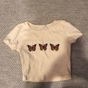 WORN ONCE cream top with three butterflies